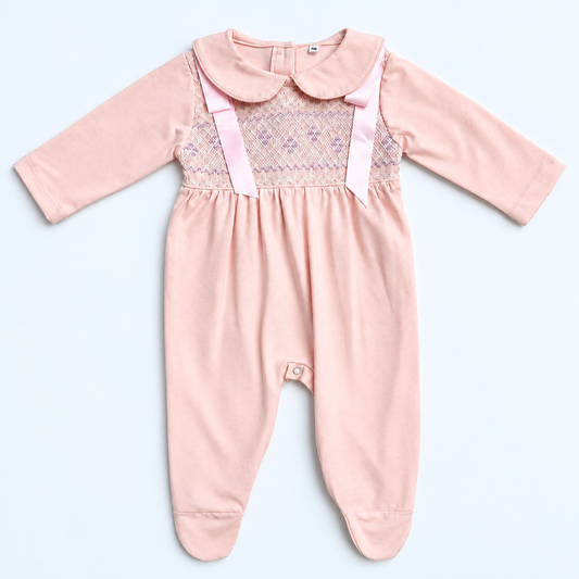 Pink and purple girls smocked baby grow